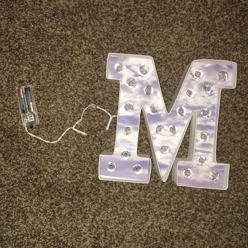 Light up "M"